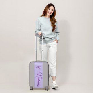 Pale lilac solid color monogrammed luggage