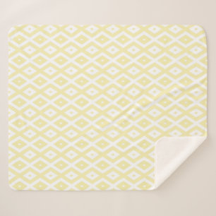Pale yellow and white diamond pattern sherpa blanket