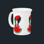 Palestine resistance fist on Watermelon Beverage Pitcher<br><div class="desc">Palestine Flag on Revolution Fist Symbol of freedom coming out from a Watermelon. In occupied Palestine, watermelon is a symbol of resistance. With its colors mirroring the Palestinian flag, the fruit can be seen from the stone walls of Gaza to the galleries of Ramallah, hinting at the political history of...</div>