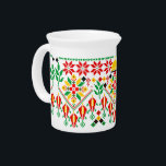Palestine Tatreez Traditional Embrodery Beverage Pitcher<br><div class="desc">Tatreez is a form of traditional Palestinian embroidery. Tatreez, meaning "embroidery" in Arabic, is used to refer to the traditional style of embroidery practiced in Palestine and Palestinian diaspora communities. The contemporary form of tatreez is often dated back to the 19th century. The style of cross-stitch embroidery called fallaḥi has...</div>
