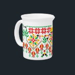 Palestine Tatreez Traditional Embrodery Beverage Pitcher<br><div class="desc">Tatreez is a form of traditional Palestinian embroidery. Tatreez, meaning "embroidery" in Arabic, is used to refer to the traditional style of embroidery practiced in Palestine and Palestinian diaspora communities. The contemporary form of tatreez is often dated back to the 19th century. The style of cross-stitch embroidery called fallaḥi has...</div>