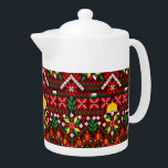 Palestine Tatreez Traditional Embrodery Teapot<br><div class="desc">Tatreez is a form of traditional Palestinian embroidery. Tatreez, meaning "embroidery" in Arabic, is used to refer to the traditional style of embroidery practiced in Palestine and Palestinian diaspora communities. The contemporary form of tatreez is often dated back to the 19th century. The style of cross-stitch embroidery called fallaḥi has...</div>