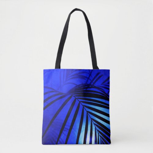 Palm leaves in the moonlight modern tropical tote bag