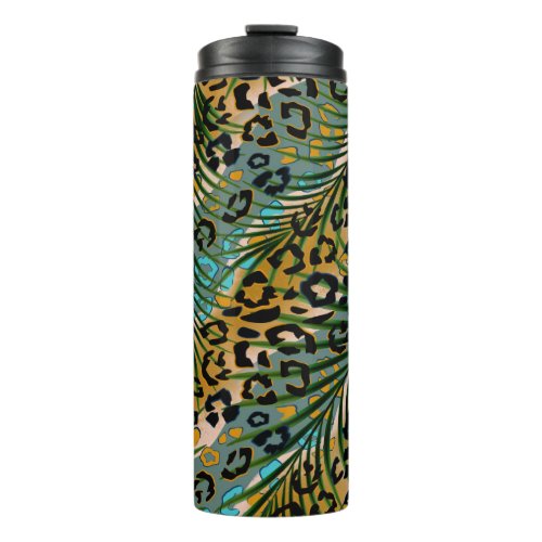 Palm leaves on a leopard background  thermal tumbler