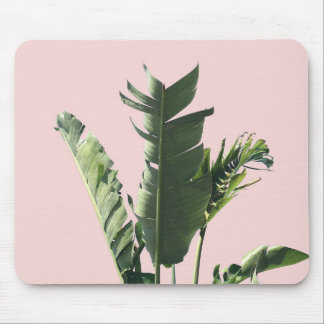 palm leaves on pink mouse pad
