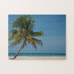 Palm tree and white sand beach 2 jigsaw puzzle