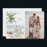 Palm Tree Beach Chairs Tropical Holiday Photo Card<br><div class="desc">This "Merry Christmas from this side of the world" Christmas holiday photo card features a palm tree with ornaments and lights, a pair of beach chairs under the umbrella on a sandy beach in watercolor. The reverse side features palm trees and ocean in watercolor. Personalize it for your needs. You...</div>