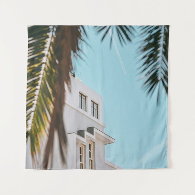 Palm tree near white concrete building tapestry (Front)