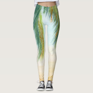 Palm tree on a sunny day on the beach leggings