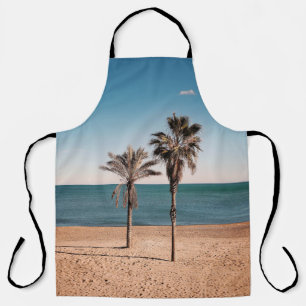 Palm tree on beach shore in the morning apron