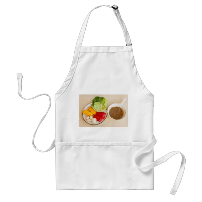 pan of bagna cauda on apron (Front)
