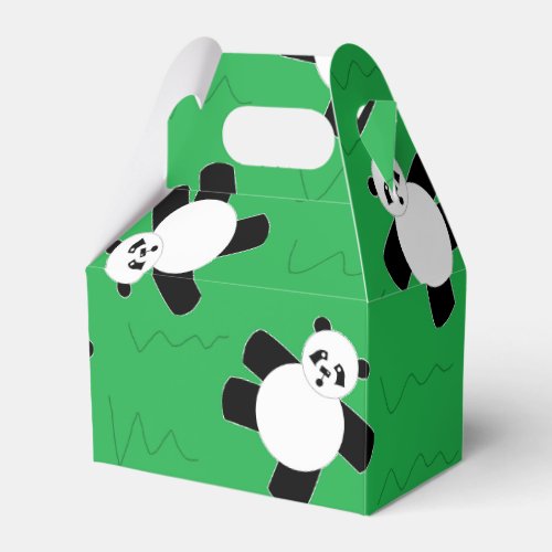 Panda bear laying on grass favor boxes