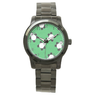 Panda bear laying on grass watch