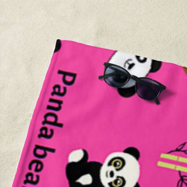 Panda bear pattern on pink beach towel (In Situ)