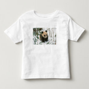 Panda cub on snow, Wolong, Sichuan, China Toddler T-shirt