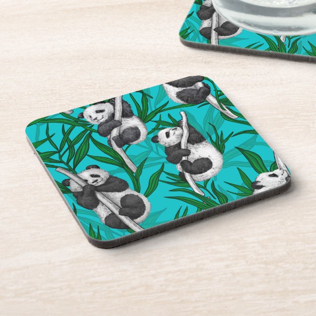 Panda cubs on turquoise beverage coaster (Left Side)