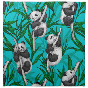 Panda cubs on turquoise cloth napkin