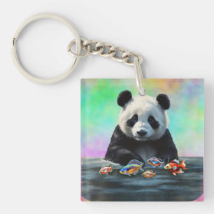 Panda gazes at Colorful Group of Swimming Fish Keychain
