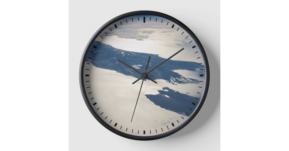 The Clock on the Strait and the Cargo of Quiet Defiance