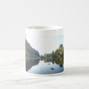 Panoramic Autumn Trees on Waterfront Coffee Mug