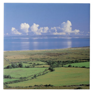 panoramic view of farm fields near the lake tile