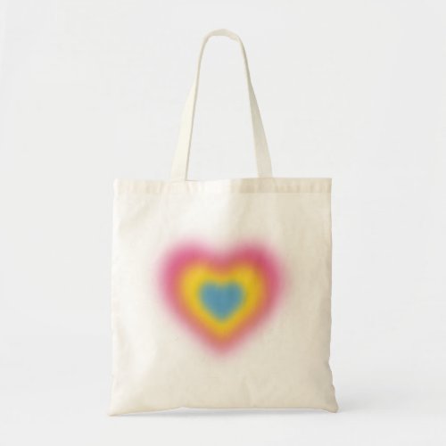 Pansexual flag colors on blurred heart tote bag