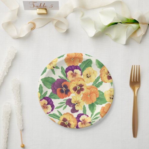 Pansies on off white paper plates