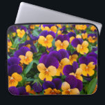 Pansy Bloom: Garden Beauty Close-up. Laptop Sleeve<br><div class="desc">Close-up of beautiful blooming pansies in the garden Celebrate the beauty of blooming pansies in the garden. Embrace the beauty of blooming pansies in the garden! Colorful and natural for your decor. background, flower, summer, nature, spring, leaf, floral, beauty, garden, green, cute, plant, colorful, beautiful, natural, yellow, petal, botany, season,...</div>