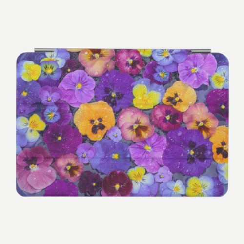 Pansy flowers floating in bird bath with dew iPad mini cover