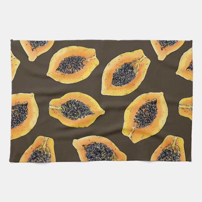 Papaya slices on dark brown kitchen towel (Horizontal)