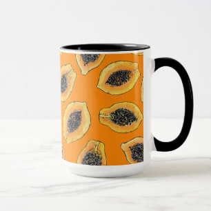 Papaya slices on orange mug