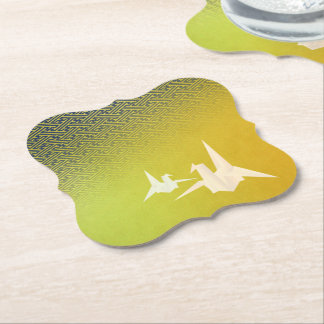 Paper coaster with a design of folded cranes and s