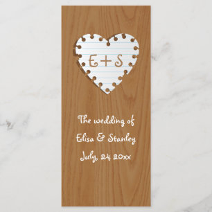 Paper heart on wood wedding program