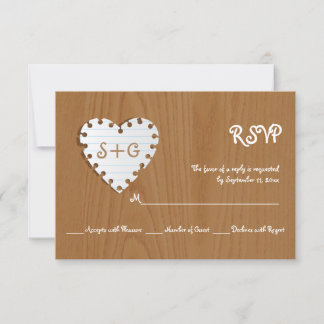 Paper heart on wood with monogram wedding RSVP