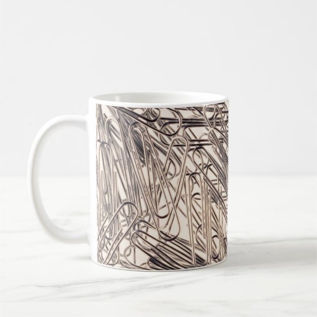 Paperclips for fastening paper sheets together coffee mug (Left)