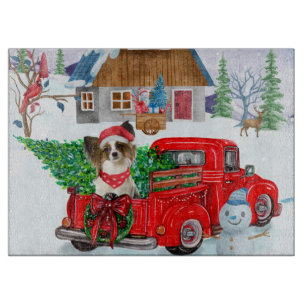 Papillon Dog In Christmas Delivery Truck Snow Cutting Board