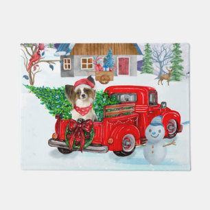 Papillon Dog In Christmas Delivery Truck Snow Doormat