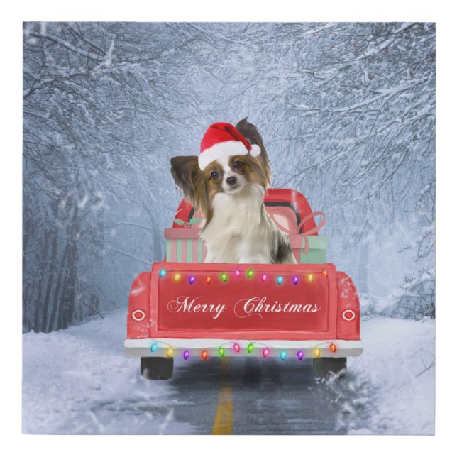 Papillon Dog in Snow sitting in Christmas Truck  Faux Canvas Print (Front)