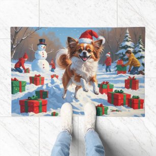 Papillon Dog Running in Snow with Christmas Hat Doormat