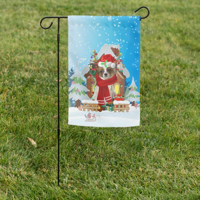 Papillon in snow with Christmas gifts Garden Flag (In SItu)