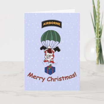 Parachuting Santa Holiday Card by holidaytime at Zazzle