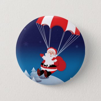 Parachuting Santa Pinback Button by pixelholic at Zazzle