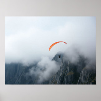 Paraglider Soaring Over Foggy Mountain Cliff Poster