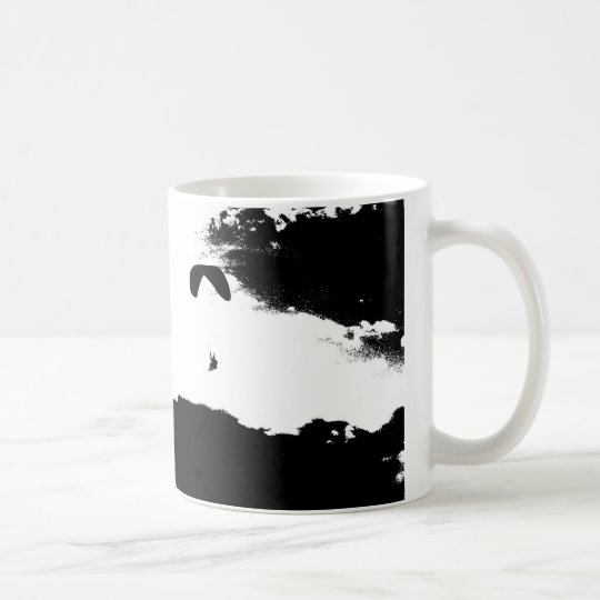 Paragliding above the clouds coffee mug