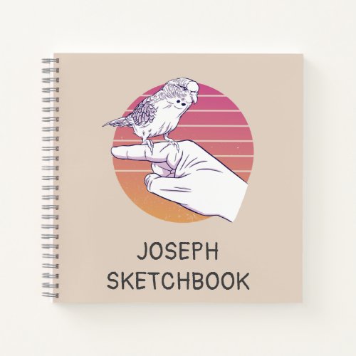 Parakeet bird on finger design notebook