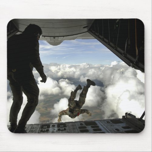 Pararescuemen jump out the back of a C_130 Mouse Pad