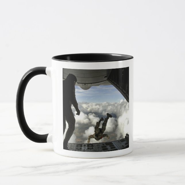 Pararescuemen jump out the back of a C-130 Mug (Left)