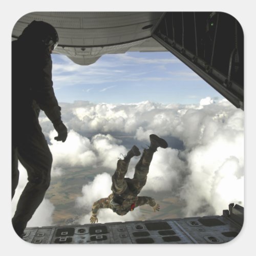 Pararescuemen jump out the back of a C_130 Square Sticker