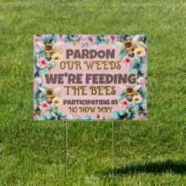 PARDON OUR WEEDS WE'RE FEEDING THE BEES NO MOW MAY SIGN