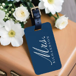 Paris Eiffel Tower Watercolor Floral Mrs Wedding Luggage Tag<br><div class="desc">Our Paris Whisper wedding Mrs luggage bag tag design evokes a romanic and lovely french elegance. Beautiful watercolor floral combination with whispers of french blue and soft lavender shades capture a Parisian elegance. Romantic typographic pairing of serifs and elegant script details further enhances the romanic style. A subtle hand-drawn Eiffel...</div>